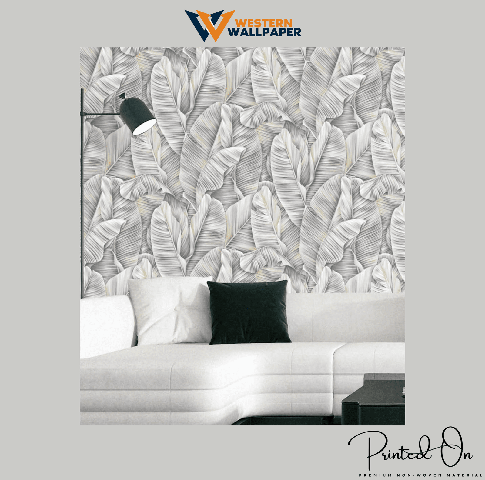 OVERSIZED TROPICAL BANANA LEAF WALLPAPER IN MONOCHROME GREY AND WHITE WITH HINTS OF GOLD FOR A STYLISH LIVING ROOM WALLPAPER.